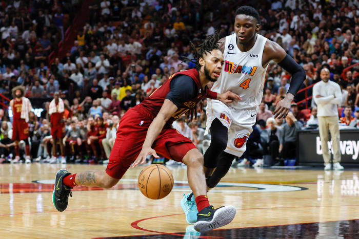 Mar 8, 2023; Miami, Florida, USA; Cleveland Cavaliers guard Darius Garland (10) drives to the basket as Miami Heat guard Victor Oladipo (4) defends during the fourth quarter at Miami-Dade Arena.